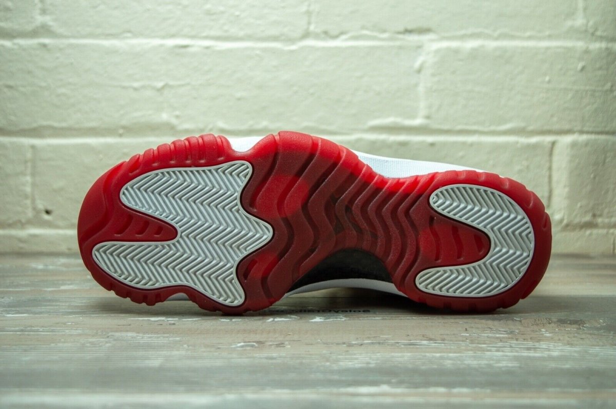 Jordan 11 low outlet cherry bottom